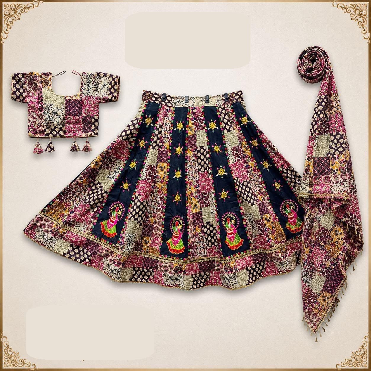Black and pink patchwork-print skirt with embroidered dancer motifs and stars, patchwork blouse with tassels and a matching dupatta