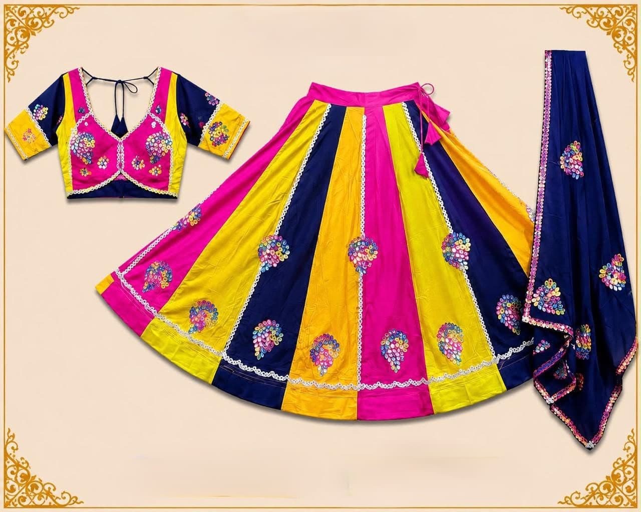 Pink, yellow and navy panelled skirt with mirror paisley motifs, matching blouse and a navy embroidered dupatta