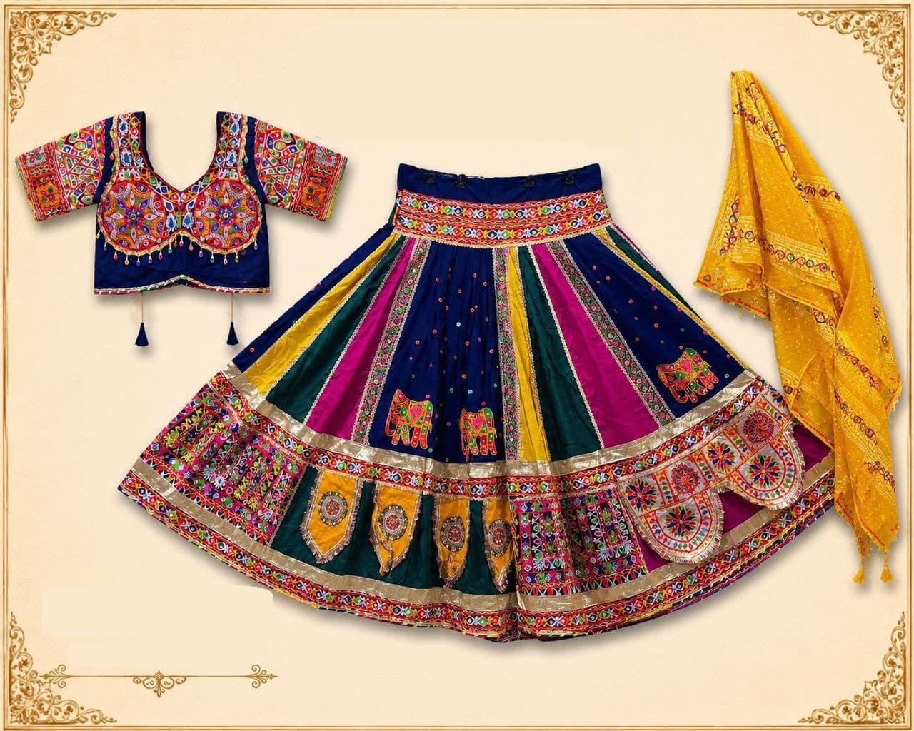 Navy, pink and green panelled skirt with heavy kutchi mirror embroidery and elephant patches, embroidered blouse and a mustard bandhani dupatta